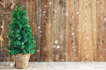 Wooden Backrground With Christmas Tree. Rustic Texture With Copy Space And Snow