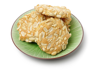 Cookies with peanuts on white background