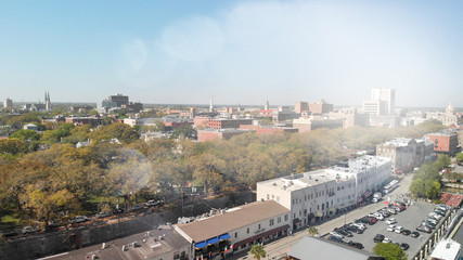 Savannah, Georgia, USA. Aerial view of city ad river on a sunny day