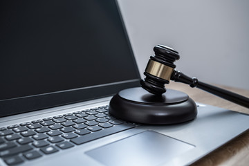 Law on laptop, cybercrime concept illustration