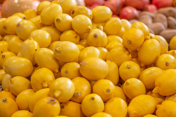 small shop. there is a yellow lemon on the window. close-up. texture.