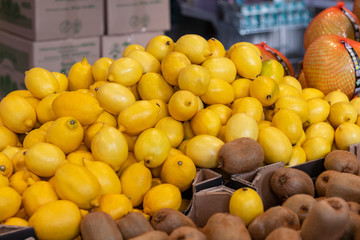 small shop. there is a yellow lemon on the window. close-up. texture.