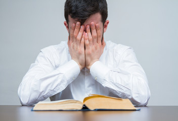 sad man with book