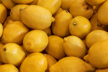 small shop. there is a yellow lemon on the window. close-up. texture.