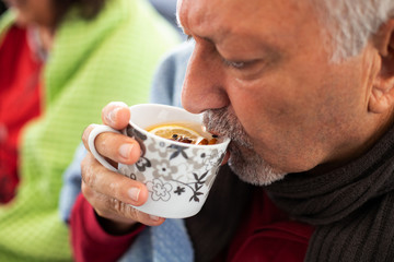 man with glass of water