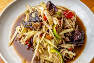 Papaya salad with crab, Som tum, Thailand Food Papaya Salad with Blue Crab and cockle