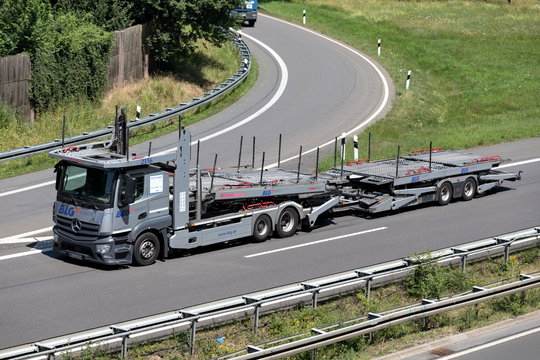WIEHL, GERMANY - JUNE 25, 2019: BLG Logistics Mercedes-Benz car-carrying truck on motorway.