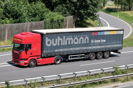 WIEHL, GERMANY - JUNE 25, 2019: Brinker Fetten Scania truck with Buhlmann curtainside trailer on motorway.