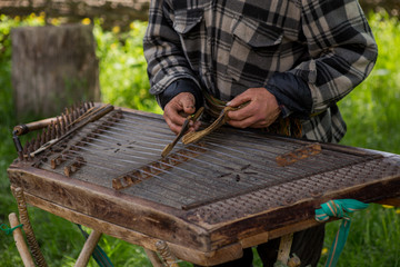  old grandfather plays cymbals