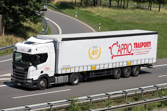 WIEHL, GERMANY - JUNE 25, 2019: Cappio Scania truck with curtainside trailer on motorway.