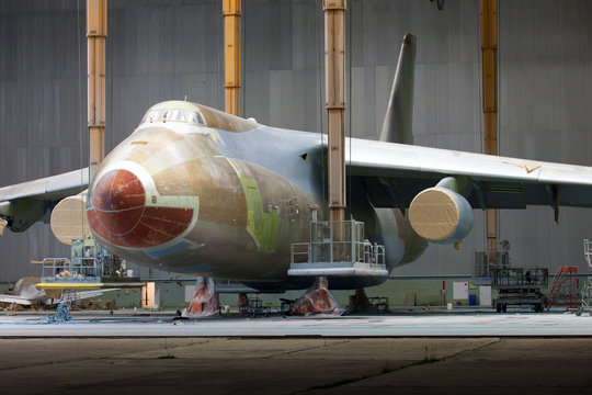 Passenger aircraft in the hangar during maintenance and painting