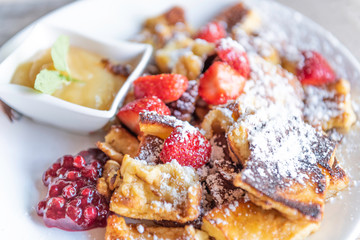 kaiserschmarrn with apple sauce and cranberries jam