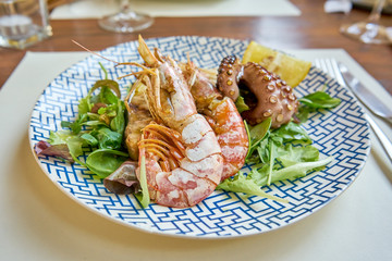 MIxed Grilled Seefood Including Schrimps Tuna Steak And Octopus