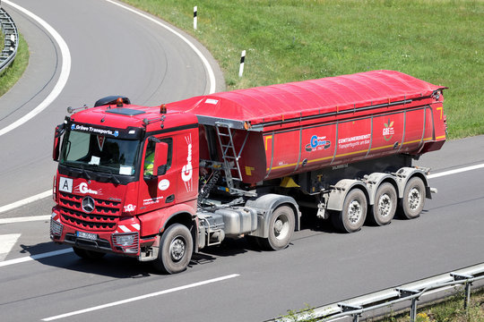 WIEHL, GERMANY - JUNE 25, 2019: Gr&auml;we Mercedes-Benz Actros truck with tipper trailer on motorway.