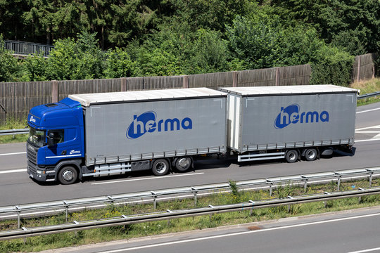 WIEHL, GERMANY - JUNE 24, 2019: herma Scania combination truck on motorway.