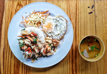 Stir fries Seafood with chili and Thai hot basil (Thai street food : Pad Kra Praow Talay)