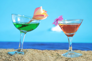 Summer day with cool cocktail on sea beach.