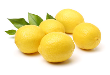 Ripe lemons on white background