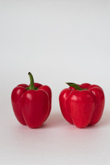 red bell Bulgarian peppers on white background 
