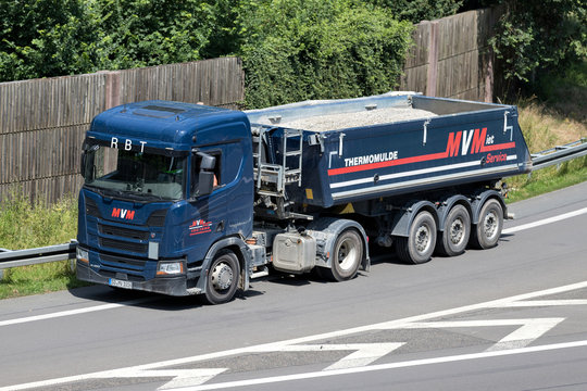 WIEHL, GERMANY - JUNE 24, 2019: MV Mietservice Scania truck with tipper trailer on motorway.