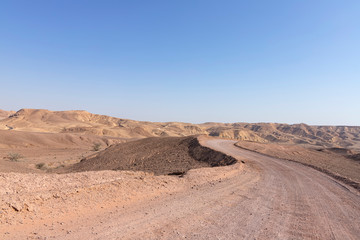 Mountain road in the mountains of Eilat against the blue sky. Israel