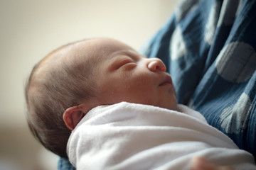 Close up and selective focus of one day old baby