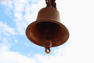bell on blue sky background