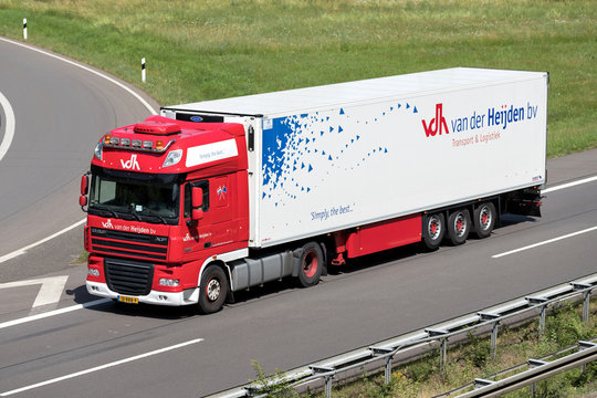 WIEHL, GERMANY - JUNE 25, 2019: Van der Heijden DAF XF truck with temperature controlled trailer on motorway.