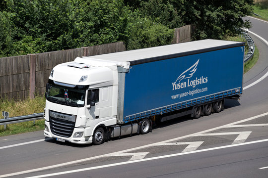 WIEHL, GERMANY - JUNE 25, 2019: Yusen Logistics DAF XF truck with curtainside trailer on motorway.