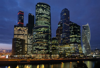 Moscow City International Business Centre skyscraper buildings on Moskva River embankment night view