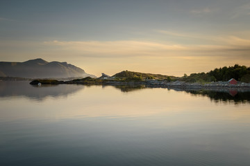 Sea view at the Atlantic Road Norway with beautiful golden sunlight at the bridge at sunset