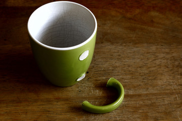 Ceramic mug with broken handle