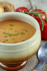 bowl of soup on a wooden table