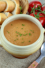 bowl of soup on a wooden table