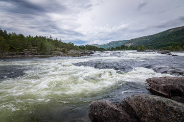 Wild and fast crrent in Otra river Norway