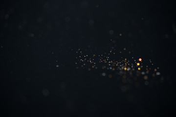 glitter vintage lights background. gold, silver, abstract lights luxury bokeh background. defocused