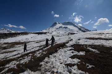 Tourist enjoy snowfall at Rohtang Pass near Manali on Wednesday. Photo by Pradeep Kumar 