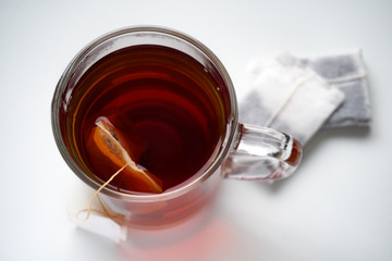 Cup of tea on white background