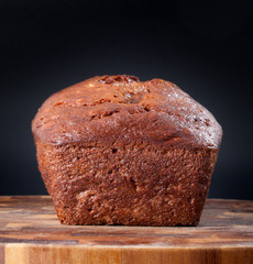 delicious banana cake on a wood plank