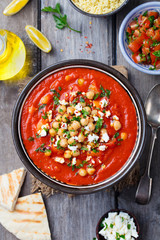 Chickpea soup. Moroccan traditional dish. Wooden background. Top view.