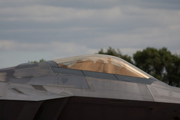 Fototapeta na wymiar F22 Raptor fast fighter jet pilot thumbs up in cockpit