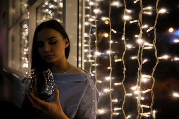 The girl in the evening rest in a cafe