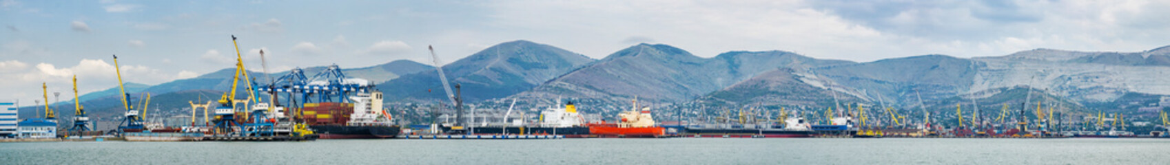 Sea, commercial, industrial port in the highlands, panorama