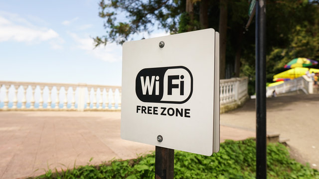 Free wi-fi signboard in park or campus, wifi zone. Wireless internet sign on the street