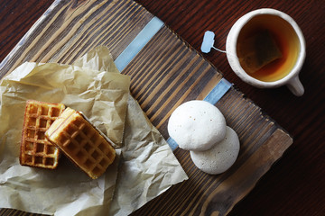 Viennese waffles with filling. Coffee table. A set of fragrant cookies for breakfast for the holiday.