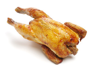 Whole roasted chicken against white background