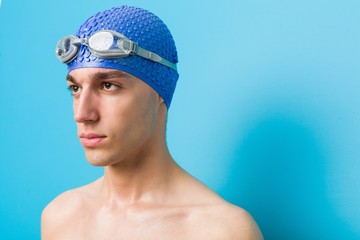 Close up of a teenager caucasian swimmer man