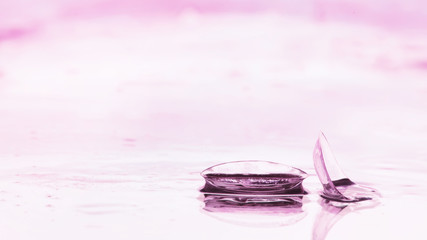 Tools for vision correction. Glasses and lenses with diopters on the background of splashes and...