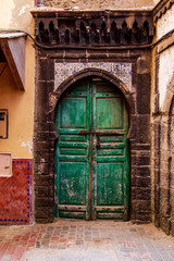 Traditional oriental doors with ornament in Morocco.