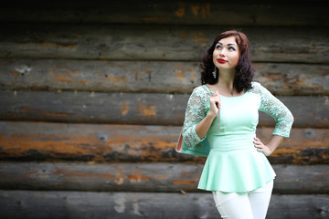 Obraz premium Beautiful girl in a spring leaf park